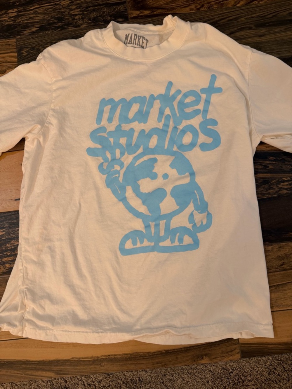 Market Studios Cream Short Sleeve Tee with Sky Blue Graphic